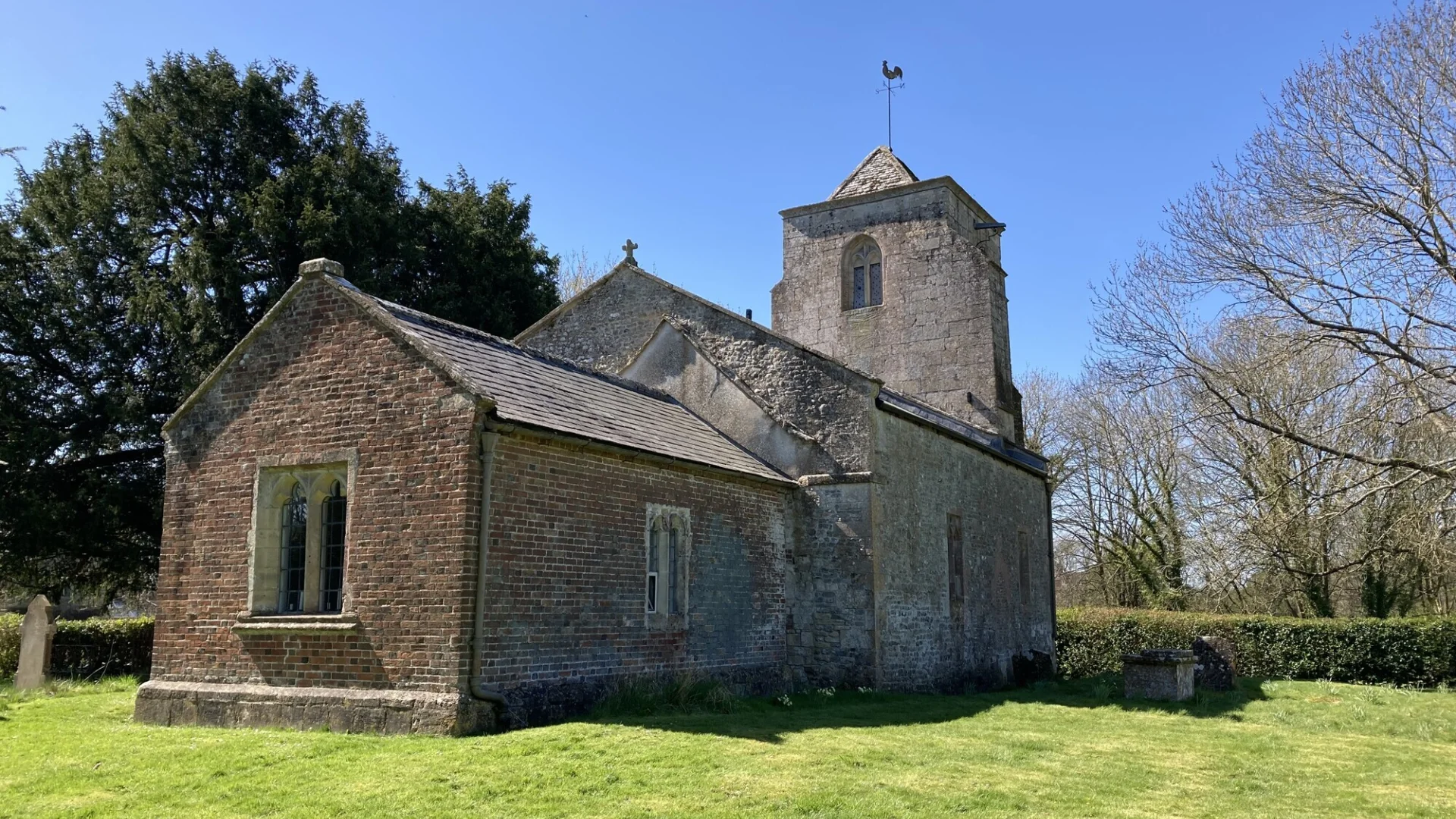 An external view of Alton Priors from the North East. Set in Pewsey Vale with its ancient yew tree beside it, All Saints in Alton Priors is a peaceful place is a haven for all who find it. In the spring wildflowers such as fritillaries abound. Home to the annual Music for Awhile classical music festival, the church is currently the subject of a fundraising appeal to raise money for a new roof following a recent lead roofing theft.