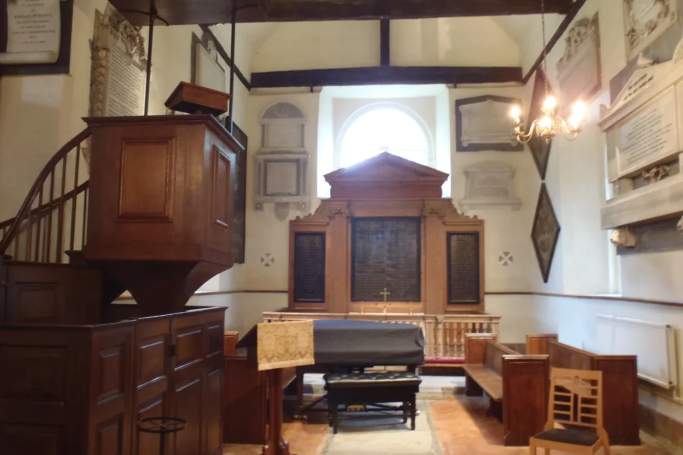 Eighteenth-century furnishings, three-decker pulpit, piano and wooden reredos with large plaques