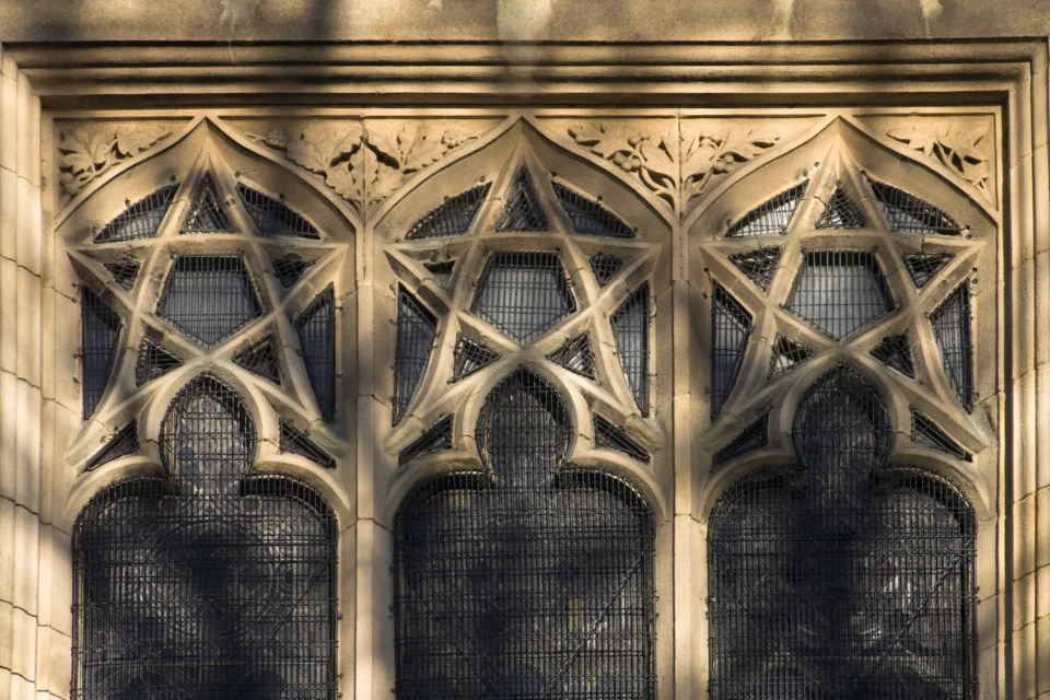 Decorative stone top of window with large stars