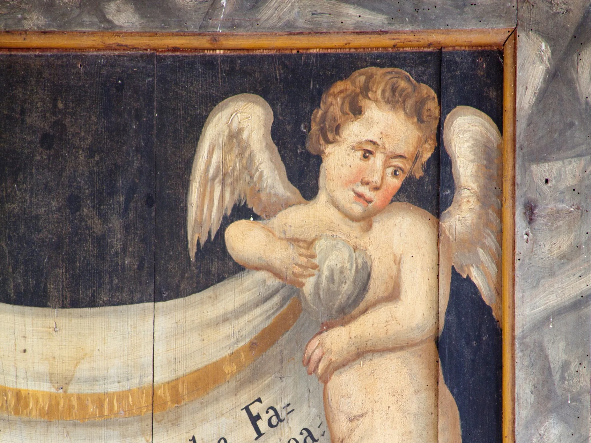 painted wall art cherub on church wall