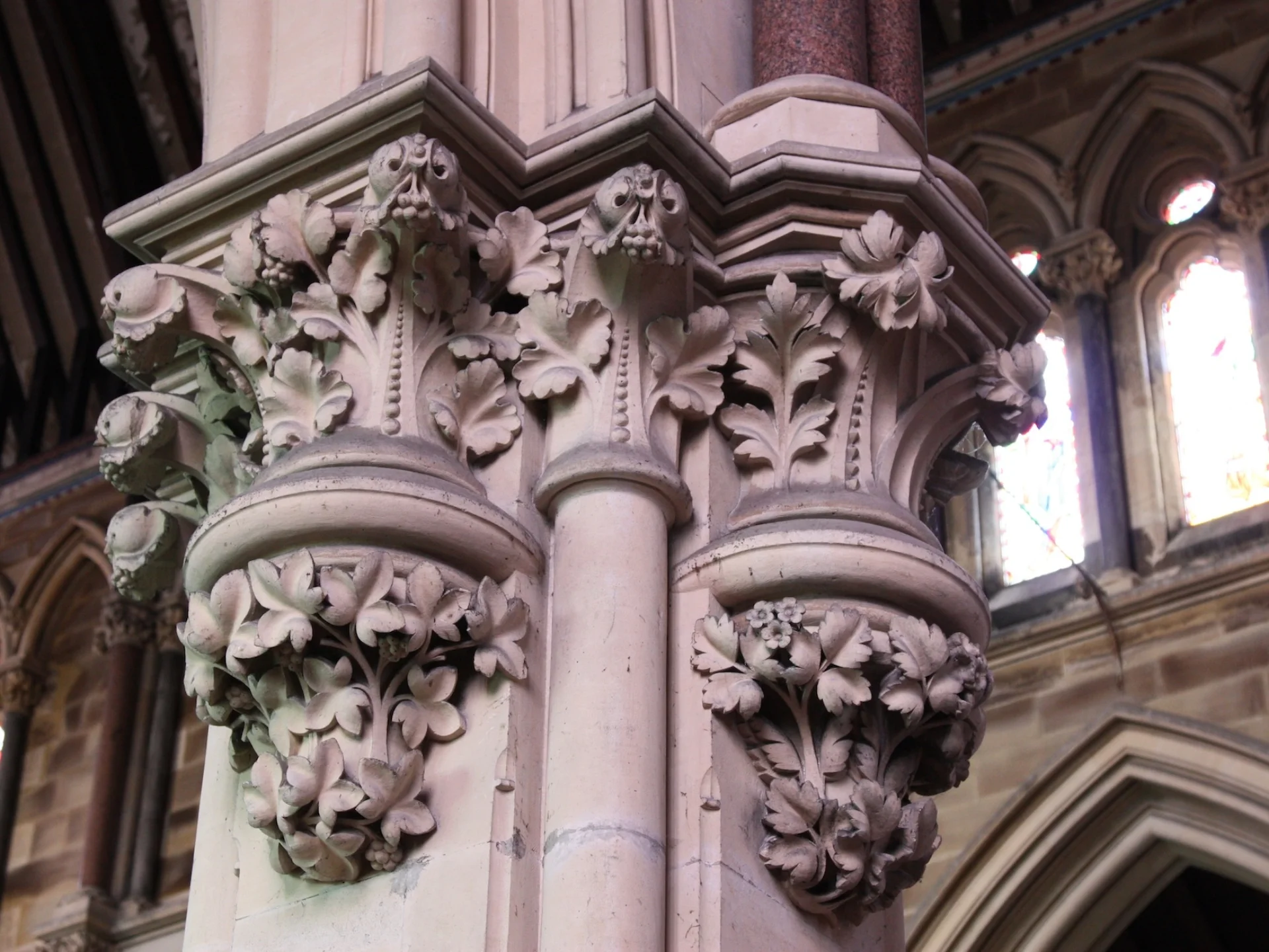 Floral capitals (stone detailing) on column