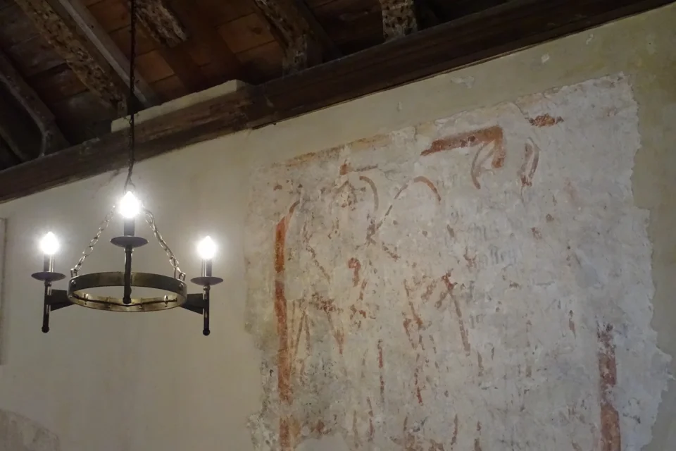 remnants of wall painting with thick red border