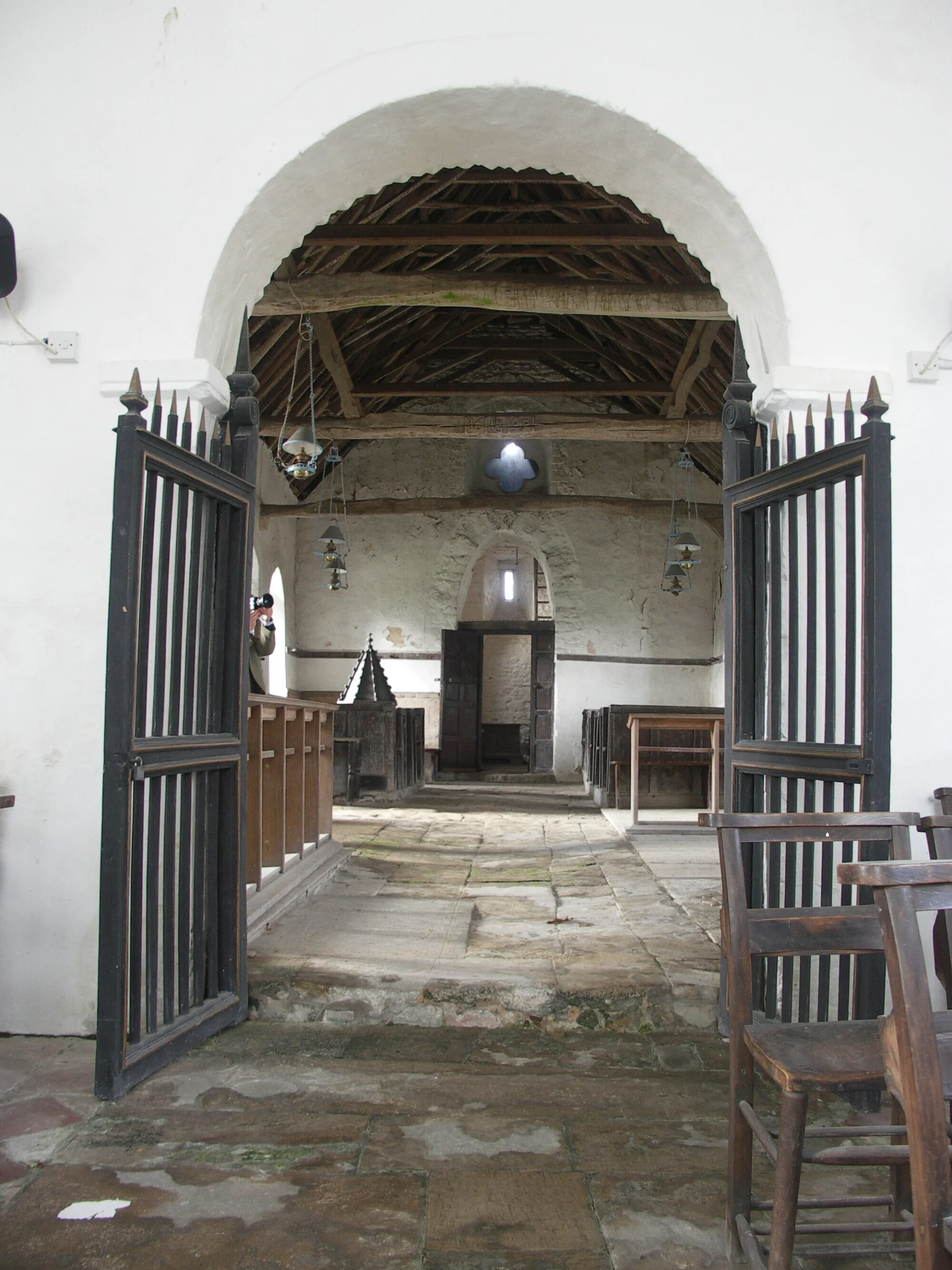 Open iron Chancel Gates leading down the central nave of St Margaret's Church, Knotting