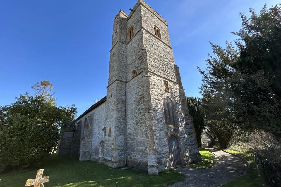 Northover Church with blue sky above