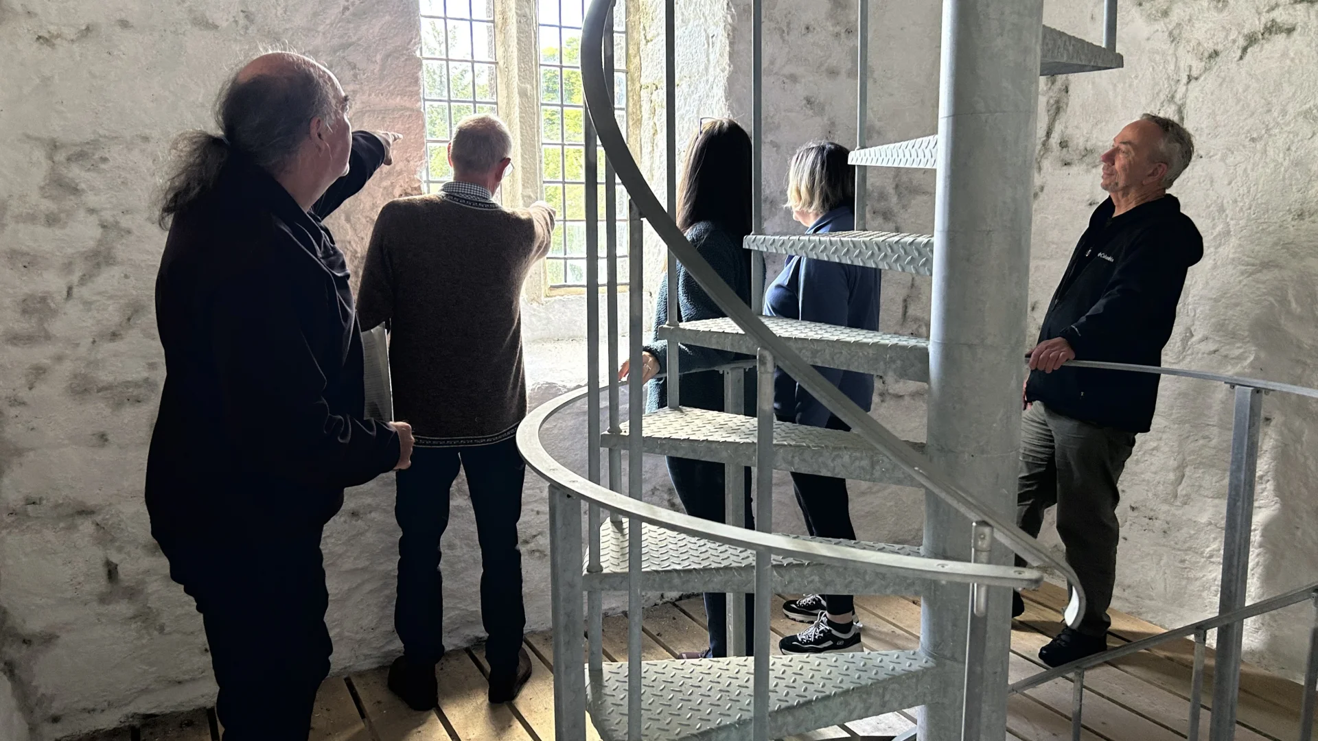 Visitors in the tower at St Michael and All Angels Church, Princetown