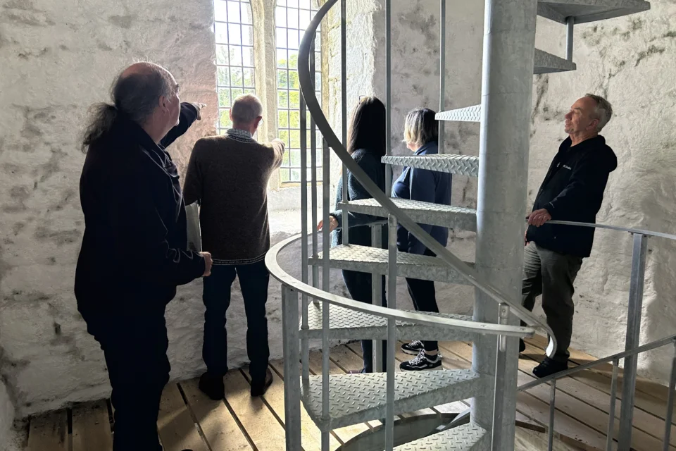 Visitors in the tower at St Michael and All Angels Church, Princetown