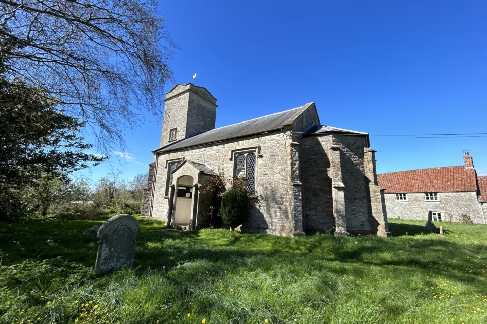 Sutton Mallet Church with blue sky above