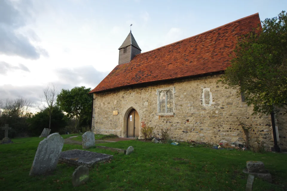 Side exterior view of the stone built church