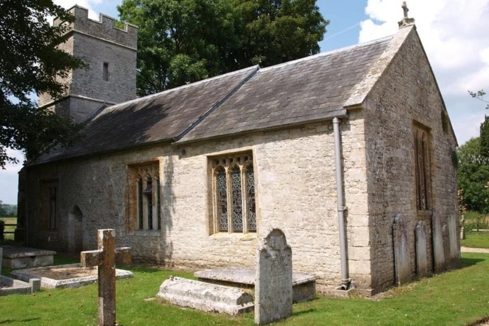 Side view of the exterior of the stone built church