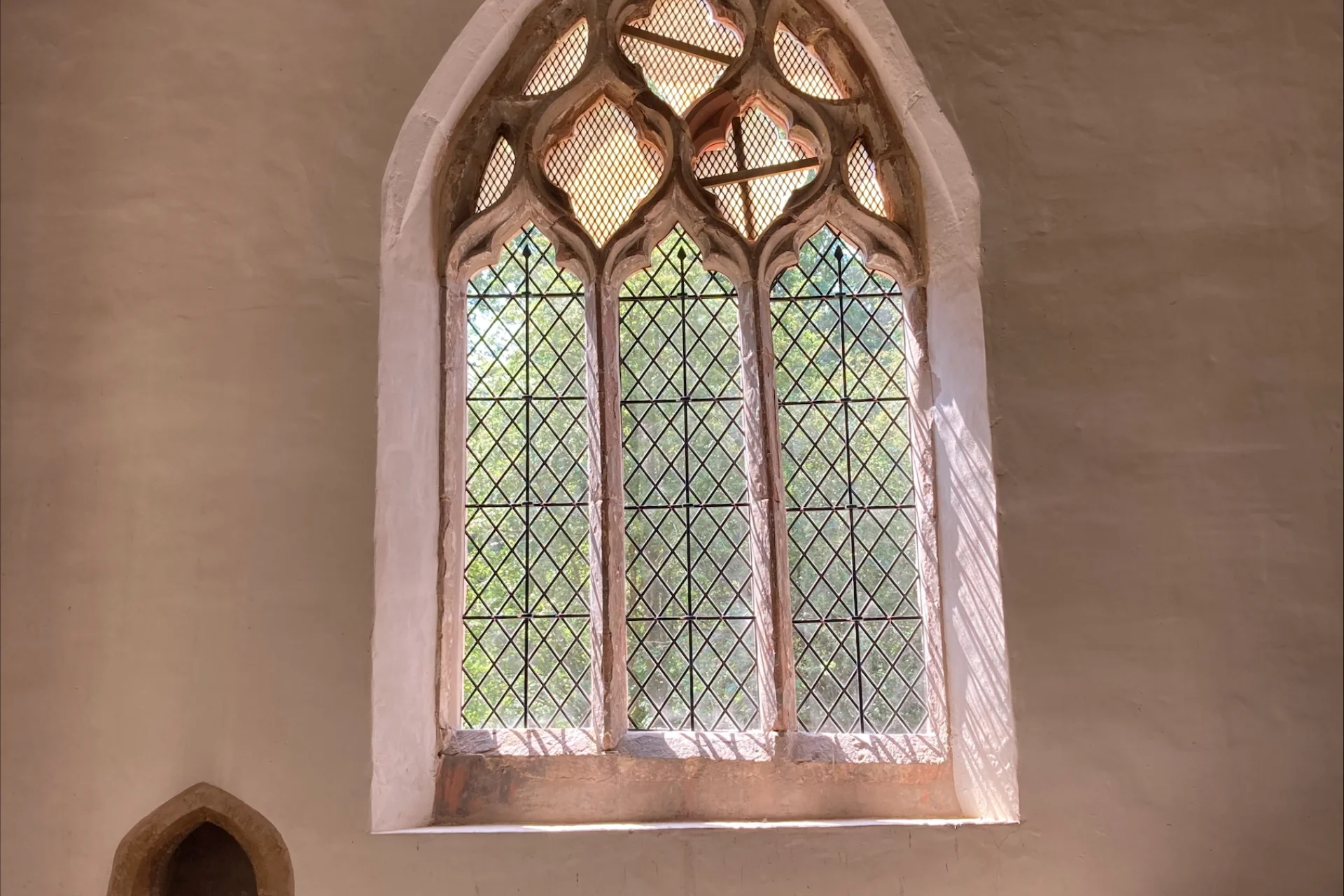 Window at St Peter's, Wolfhamcote with replaced glass window.