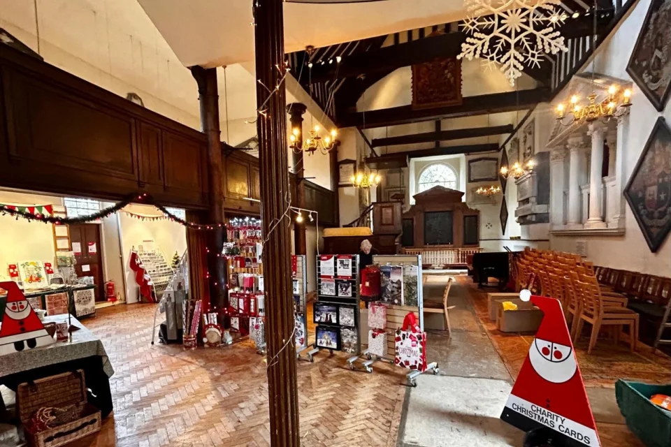 interior of Esher with cards for good causes shop set up