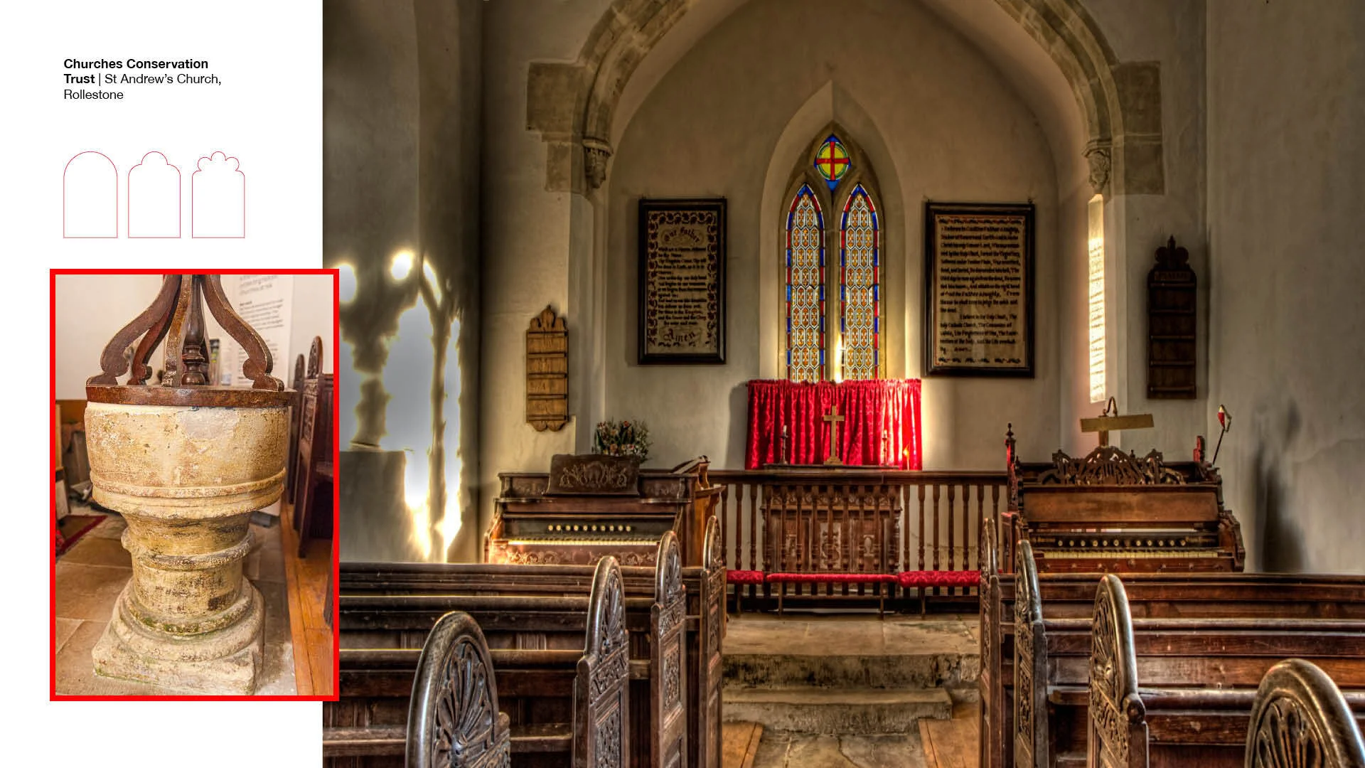 Interior of whitewashed stone church showing font and altar with red cloth