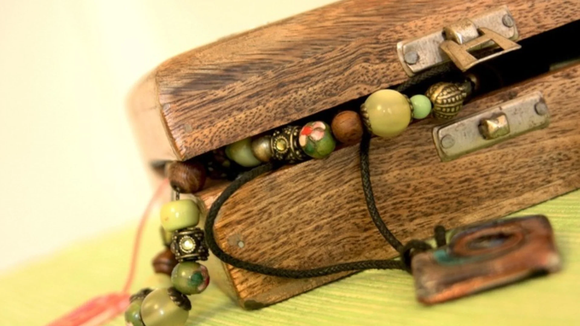 wooden jewellery box with jewellery shown