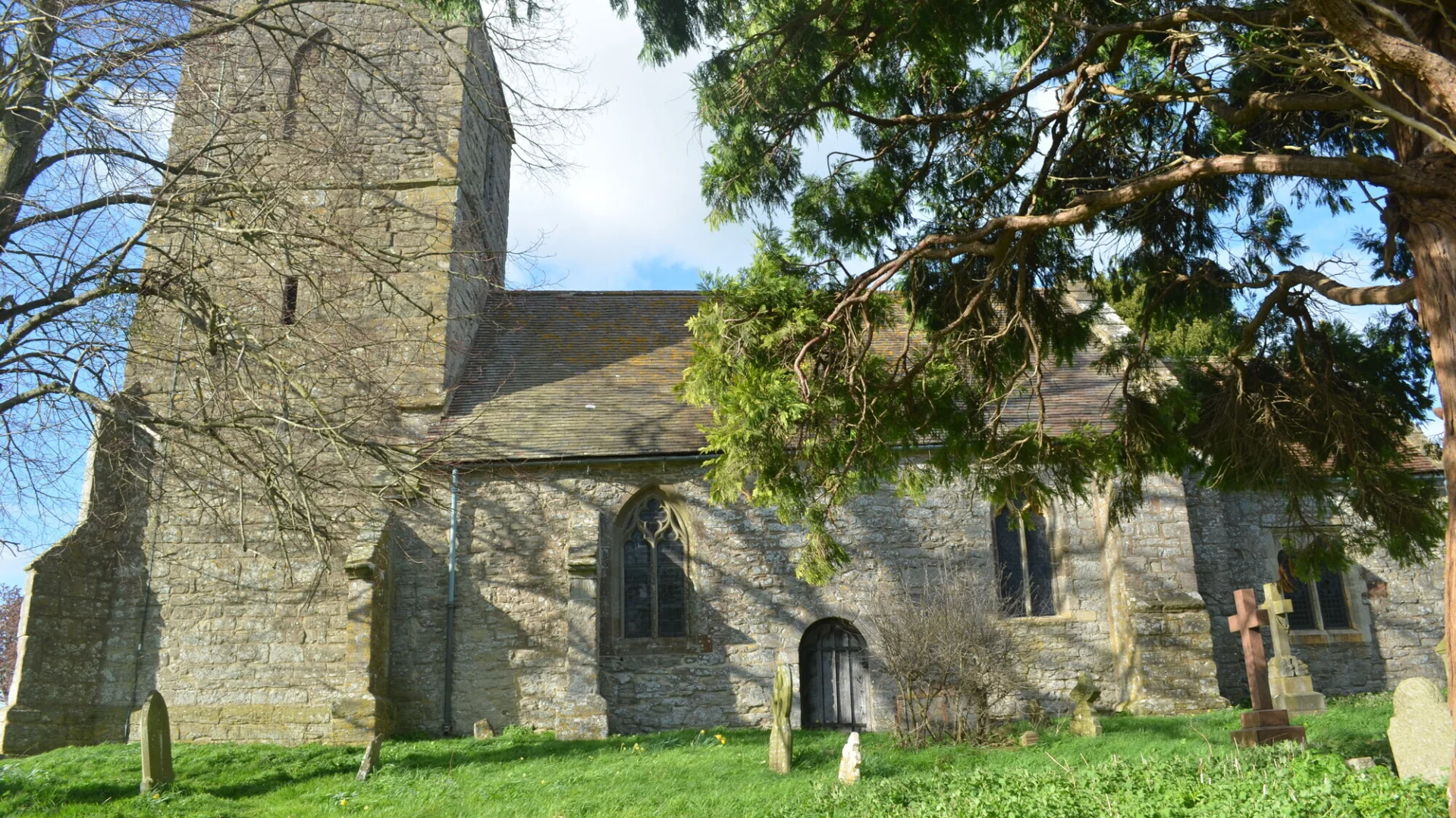 South side of Pendock church with tree