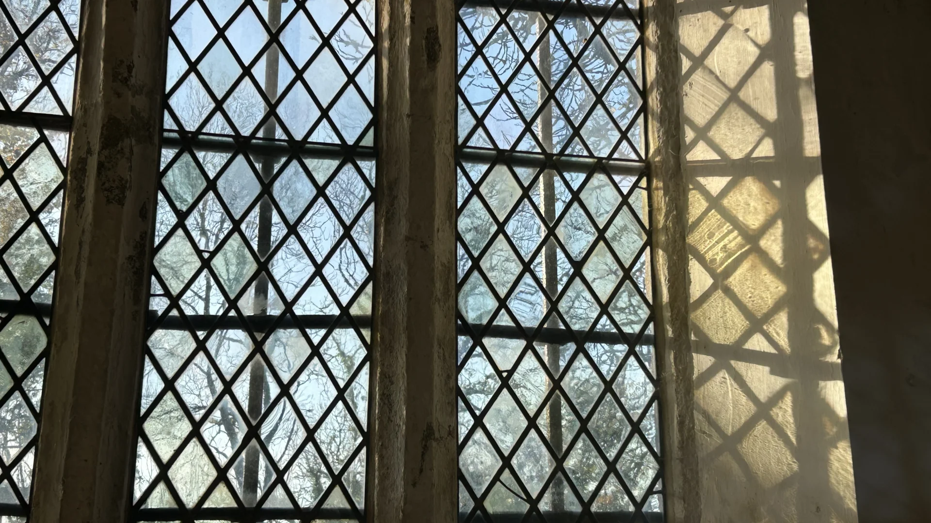 West Ogwell church window showing autumn light