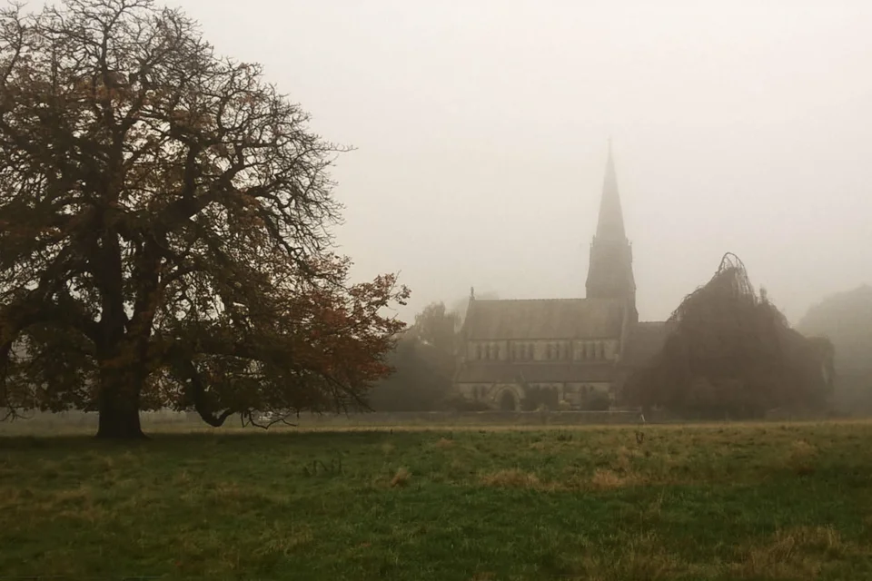 Church of Christ the Consoler in a distant, foggy field