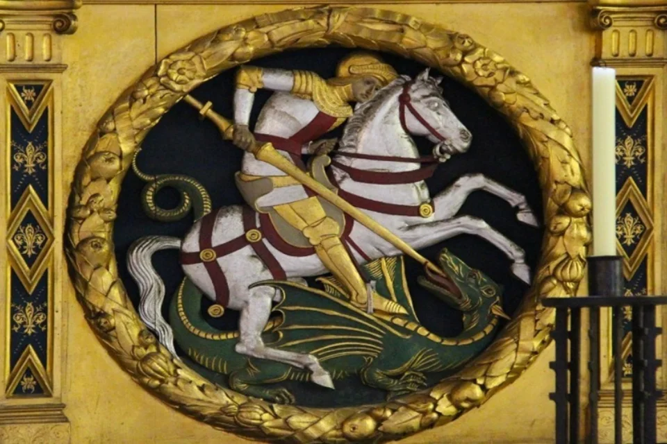 image of st george on a horse battling the dragon