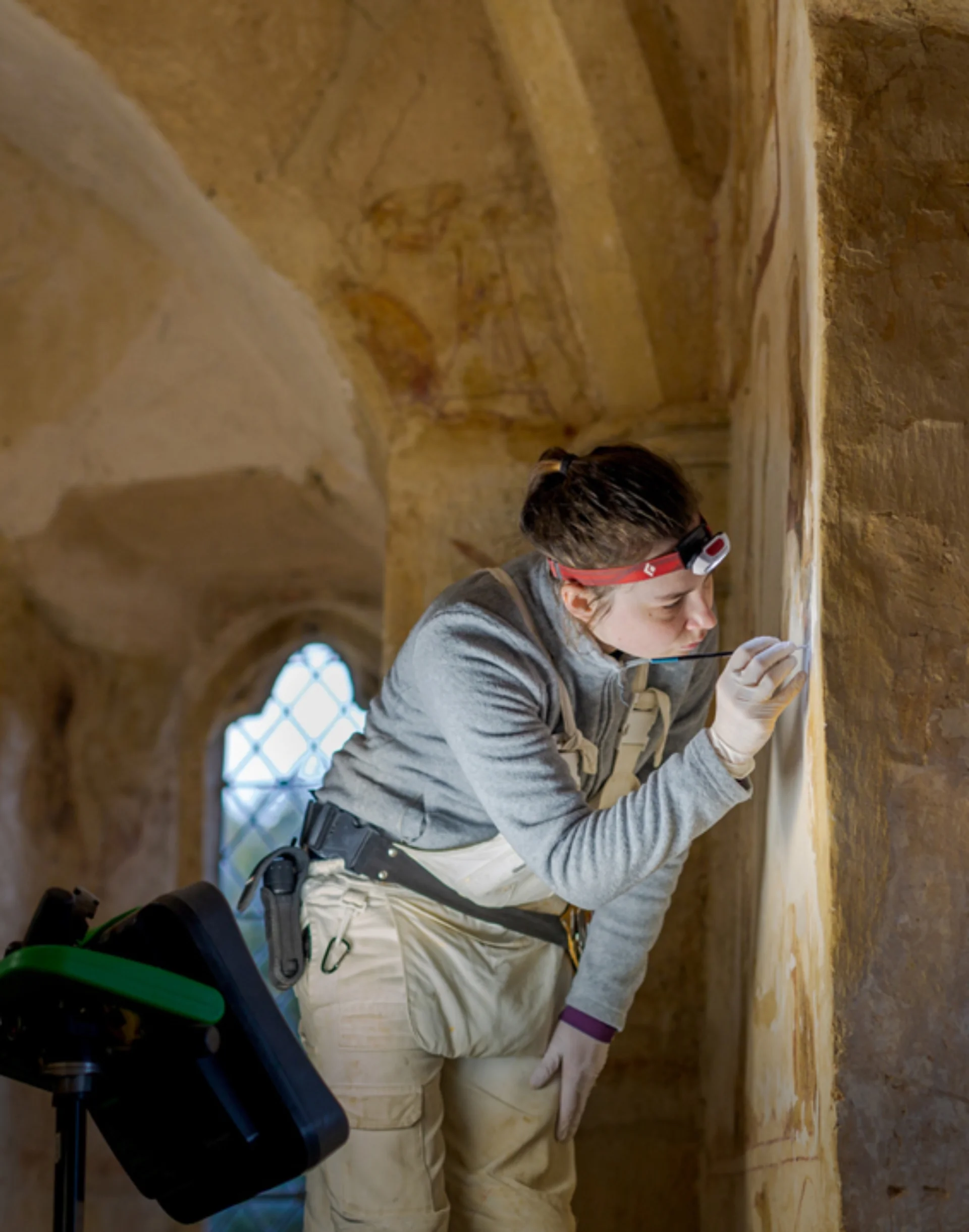A Courtauld MA student conserving the important 13th-century wall paintings in Longthorpe Tower, Peterborough, which for